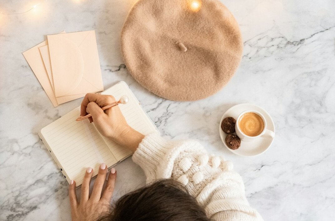 person journaling thoughts