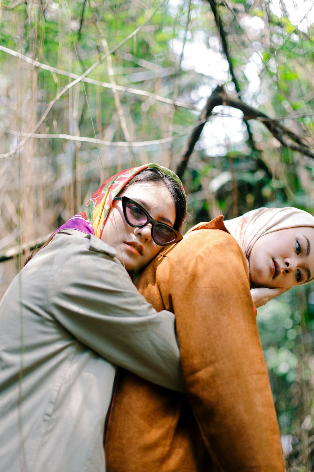 friends hugging outdoors