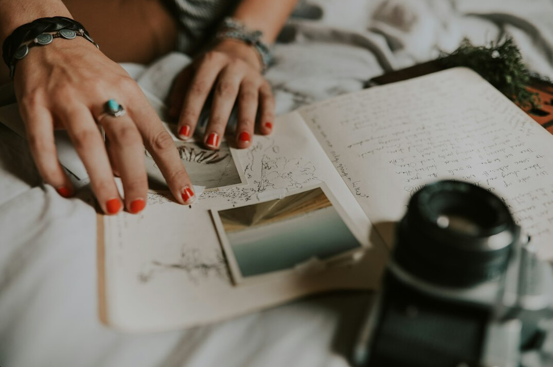 person writing journal