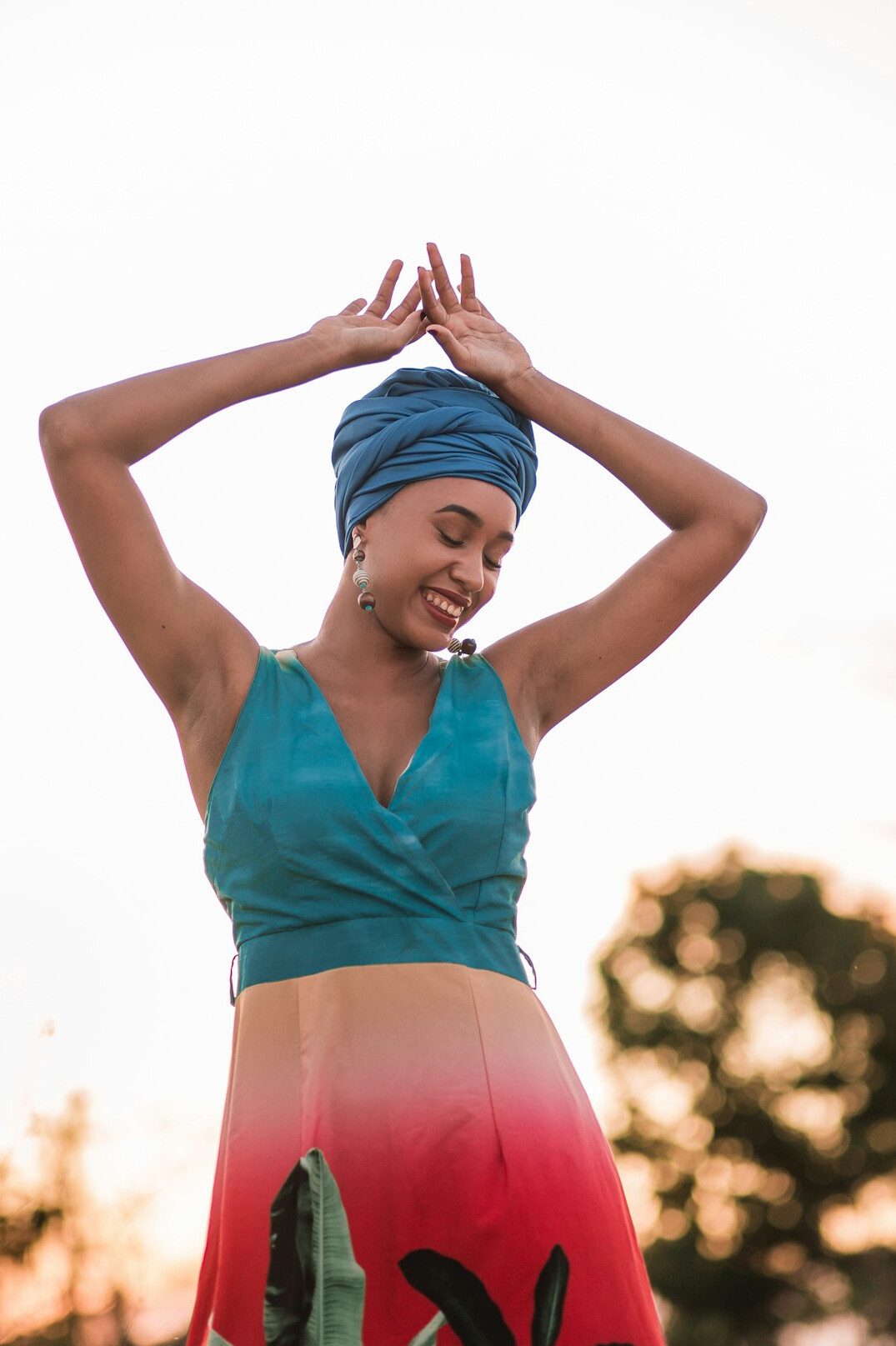 Brazilian woman smiling and gesturing while speaking confidently